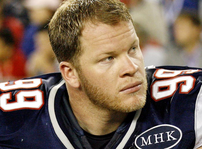 A Sept. 1, 2011, photo shows New England Patriots' Mike Wright on the sideline at a preseason game against the New York Giants.