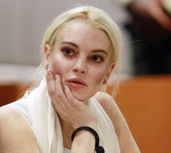 Lindsay Lohan is seen in court today before being taken into custody by Los Angeles County sheriff's deputies when a judge found her in violation of probation.