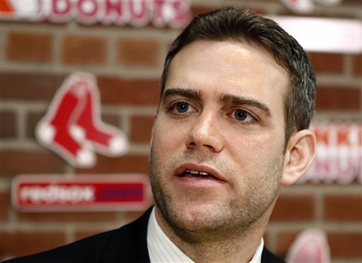 Theo Epstein still plans to become the Cubs’ GM, but compensation to the Red Sox remains up in the air.