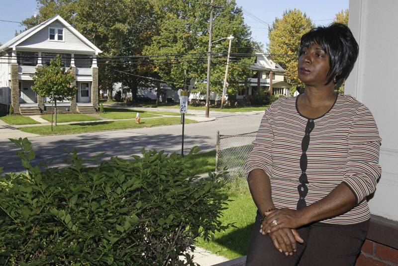 TRYING TO FIND WORK: Selena Forte, 55, poses for a photo at her home in Cleveland, Ohio. After two years on the unemployment rolls, Forte thought she had the right experience for a temporary job opening at FedEx. But she says a job recruiter told her the company wouldn't consider her because she had been out of work too long.