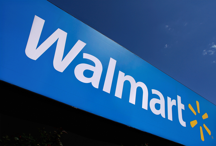 A spokesman for Wal-Mart says, "It is a difficult decision to raise rates. But we are striking a balance between managing costs and providing quality care and coverage."