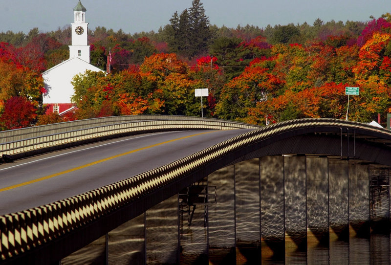 Foliage colors the countryside beyond the bridge that connects Edgecomb and Wiscasset.