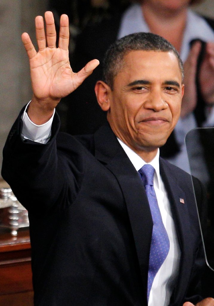 President Obama waves as he arrives to deliver a speech on job creation to a joint session of Congress on Sept. 8.
