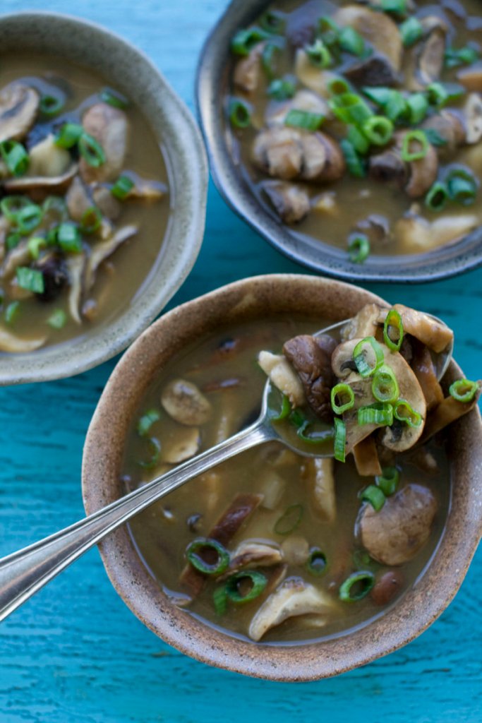 Mushroom and miso soup. Miso comes in many varieties; generally, the lighter the color, the milder the flavor.