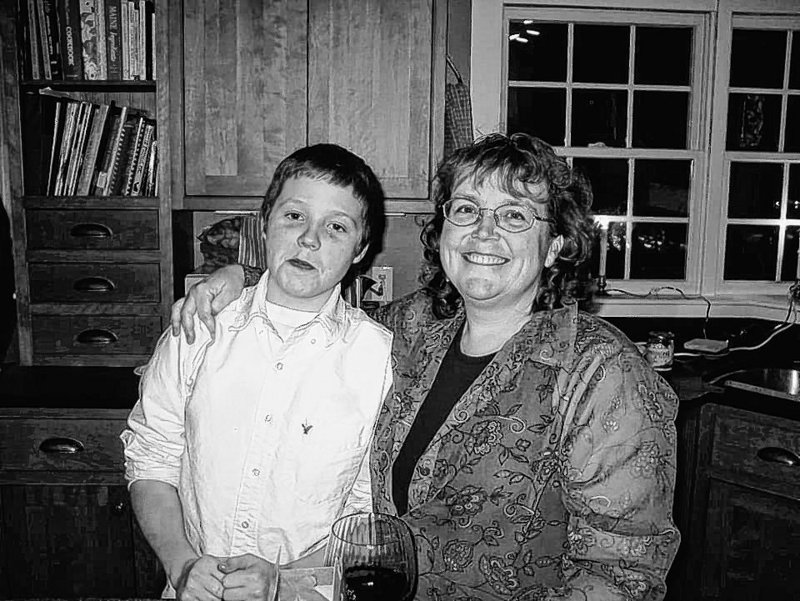 Nancy Anne Kane and her son Ben, now 17, at a Christmas party several years ago. “He was her rock,” Ms. Kane’s sister said.