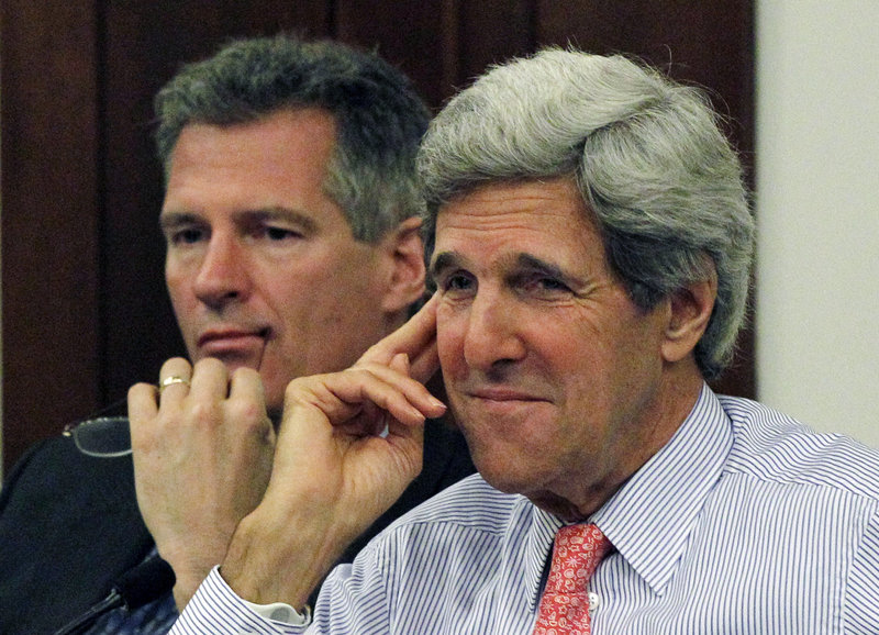 U.S. Sens. Scott Brown, R-Mass., left, and John Kerry, D-Mass. listen during a hearing at the Statehouse in Boston on the condition of the region’s fishing industry.