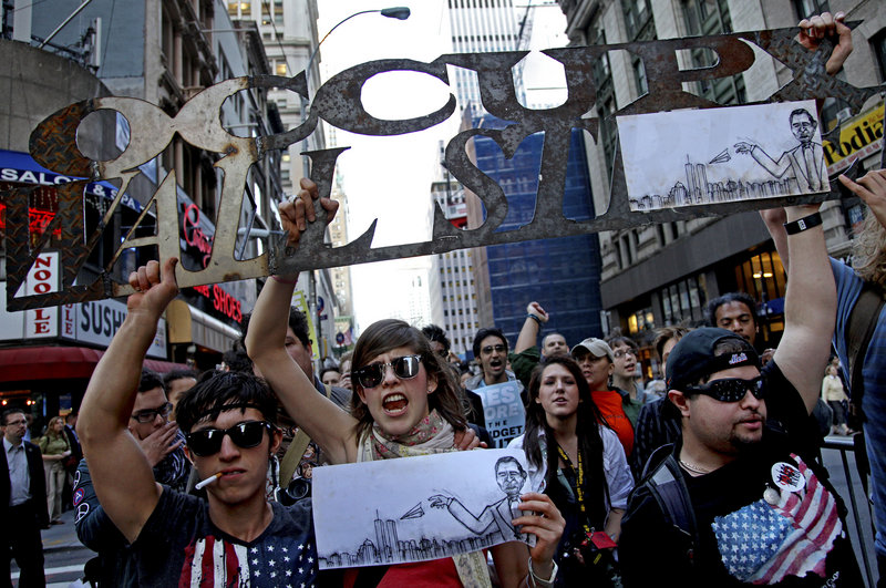The Associated Press Occupy Wall Street marchers demonstrate Oct. 5 in New York.