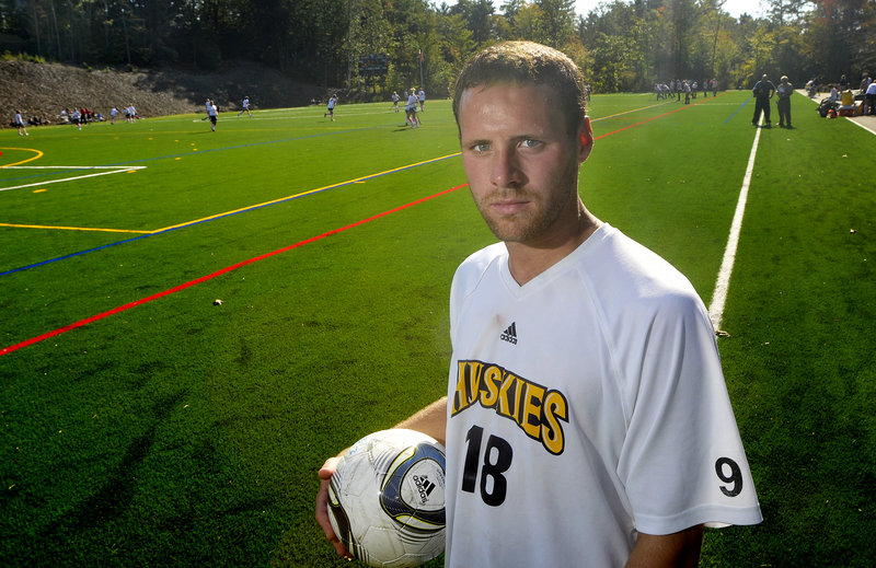 Jeff Soules has had to handle more than most college captains, dealing with his own grief while lifting the University of Southern Maine men's soccer team following a teammate's suicide. Team members wear Buddy Reid's No. 9 on their sleeves.