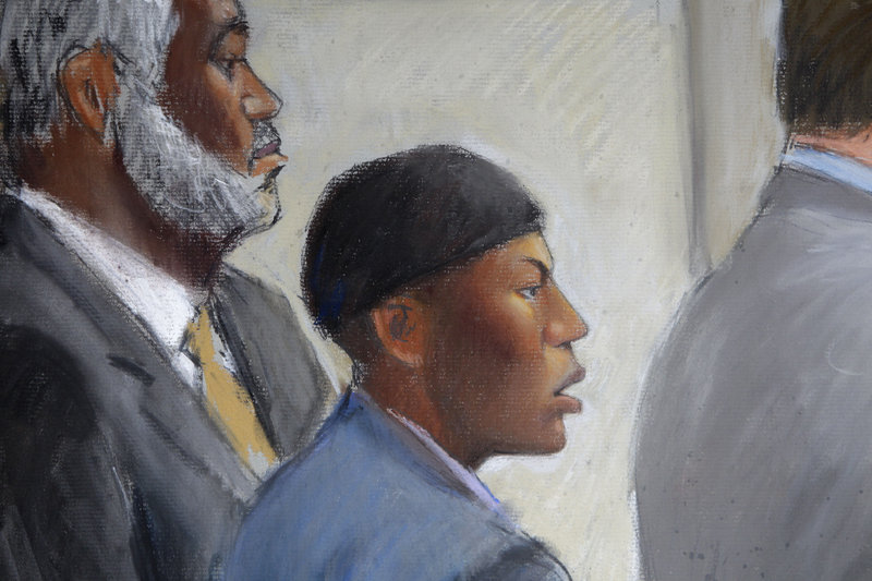An artist’s sketch shows Umar Farouk Abdulmutallab, center, in court with Anthony Chambers, his lawyer.