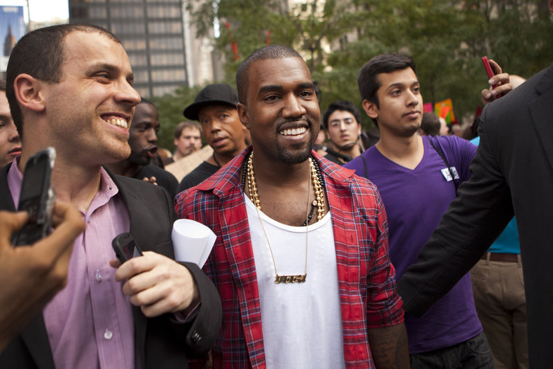 Musician Kanye West visits the "Occupy Wall Street" protests in Zuccotti Park.
