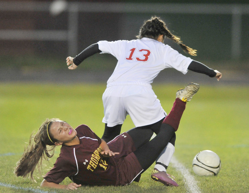 Amanda Arnold of Thornton Academy hits the ground Wednesday night after getting tangled with Anh Nguyen of South Portland. Arnold scored twice as Thornton improved to 10-1-1 with a 4-0 victory at South Portland.