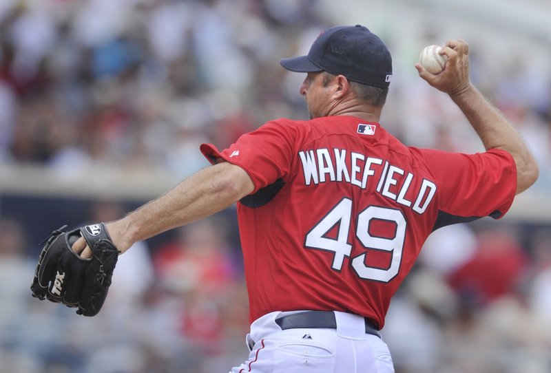Red Sox pitcher Tim Wakefield (shown in an exhibition game last April) and all his teammates couldn’t get Boston into the playoffs this year, laments a reader.
