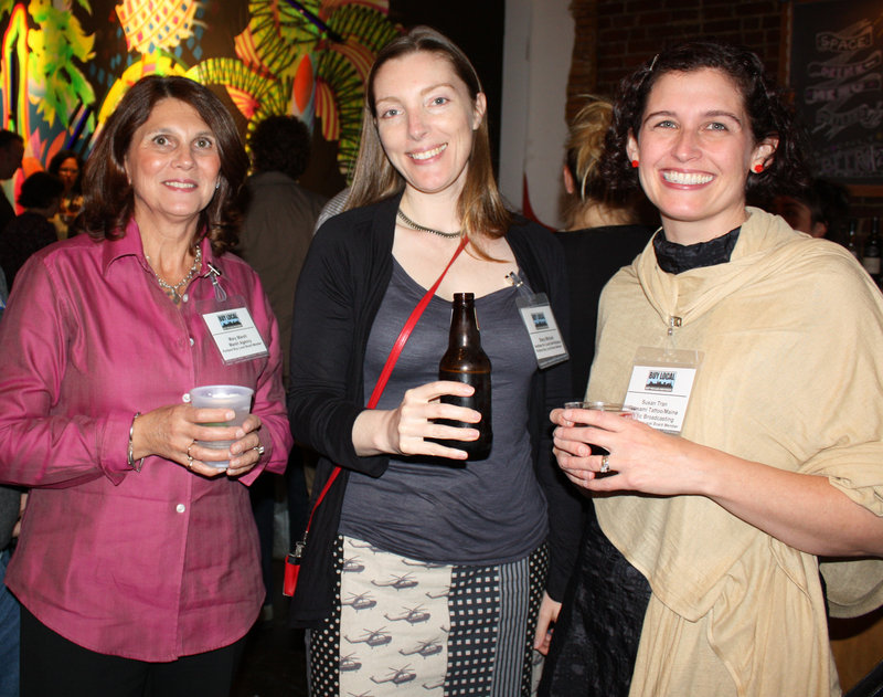 Board members Mary Marsh of the Marsh Agency and co-chair of the event; Stacy Mitchell of the Institute of Local Self-Reliance; and Susan Tran of Tsunami Tattoo and Maine Public Broadcasting.