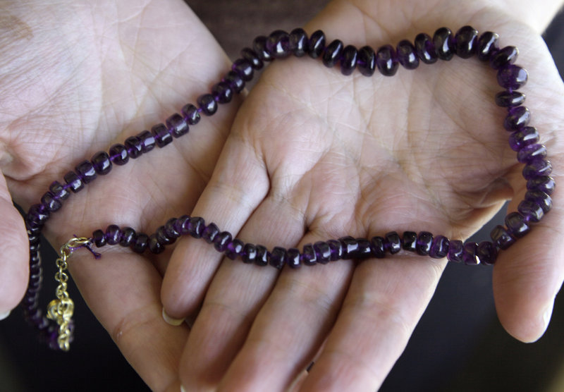 To pull in customers for the holidays, Stauer is giving away amethyst necklaces. A third of customers who took advantage of a similar promotion in 2009 bought additional items.