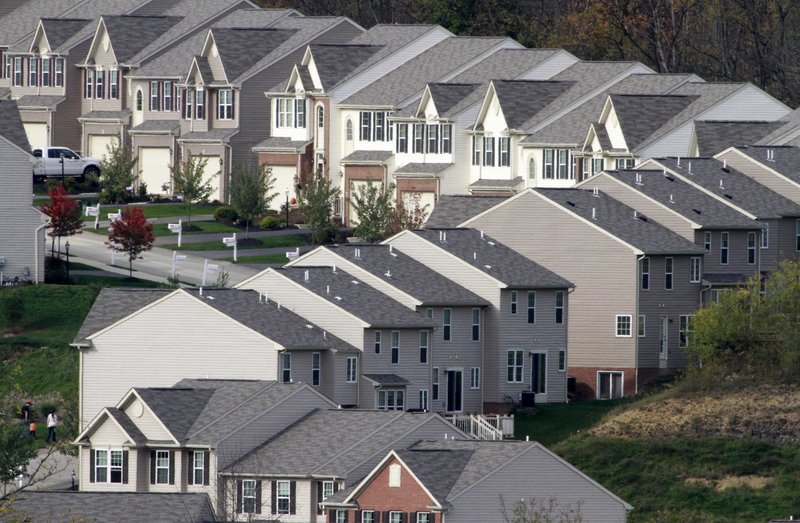 New homes wind across a hillside in Canonsburg, Pa. Homebuilding increased in September, but the number of Americans who bought previously occupied homes fell. “This is a significant barrier to recovery,” says Ian Shepherdson of High Frequency Economics.