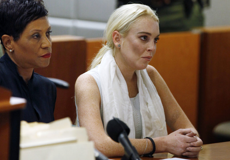 Lindsay Lohan appears in court Wednesday before she was taken into custody by Los Angeles County sheriffs deputies.
