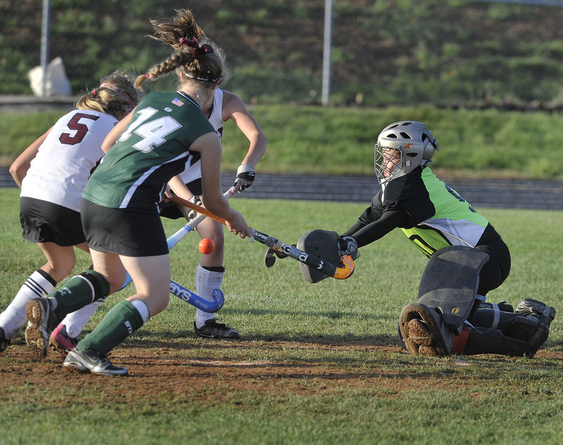 aylor Eells, the goalie for Leavitt, moves out to block a Greely scoring attempt Thursday during Greely’s 1-0 victory in a Western Class B field hockey quarterfinal.