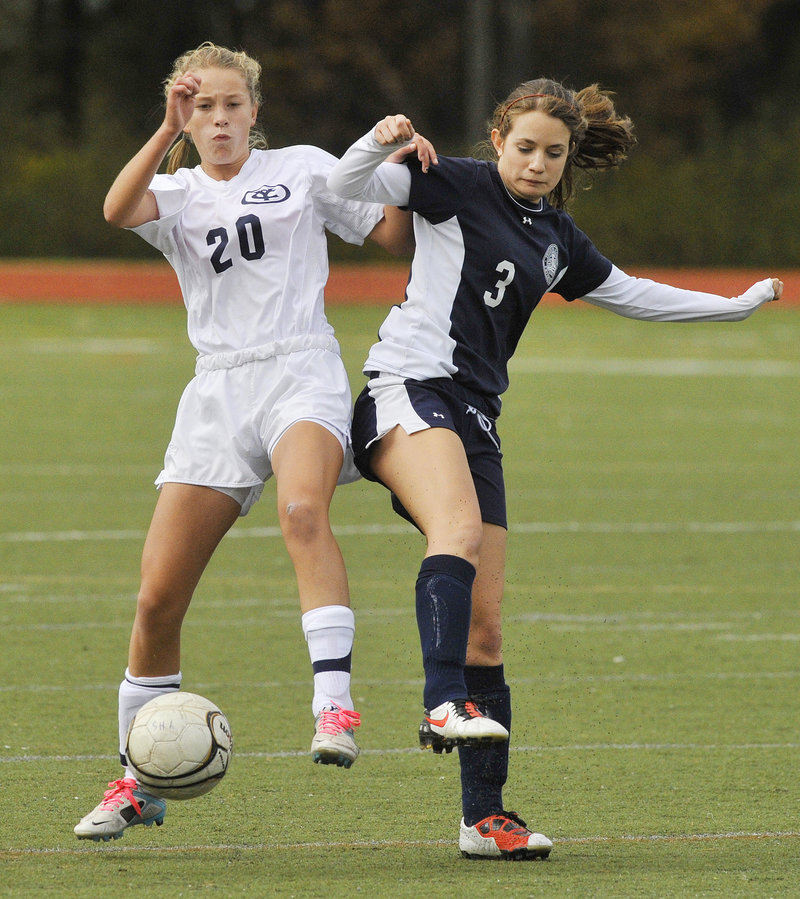 Emma Torres, left, of Yarmouth and Kallie Moulton of Fryeburg Academy try to gain control of a loose ball. Yarmouth will play No. 3 Falmouth in the quarterfinals on Tuesday.
