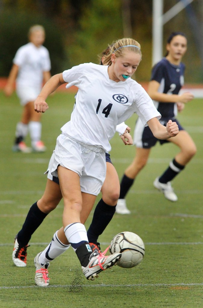 Ariel Potter of Yarmouth stays ahead of a defender and delivers a shot. Potter had the Clippers’ first goal in a 3-0 victory.