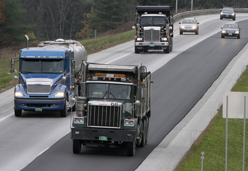 Trucks travel on Interstate 89 last week in Berlin, Vt. Vermont officials are disputing the findings of a federally sponsored study showing that fatalities from accidents involving big trucks tripled, from one to three, when weight limits were raised. Heavier trucks were allowed on Maine and Vermont interstate highways in 2010 under pilot studies.