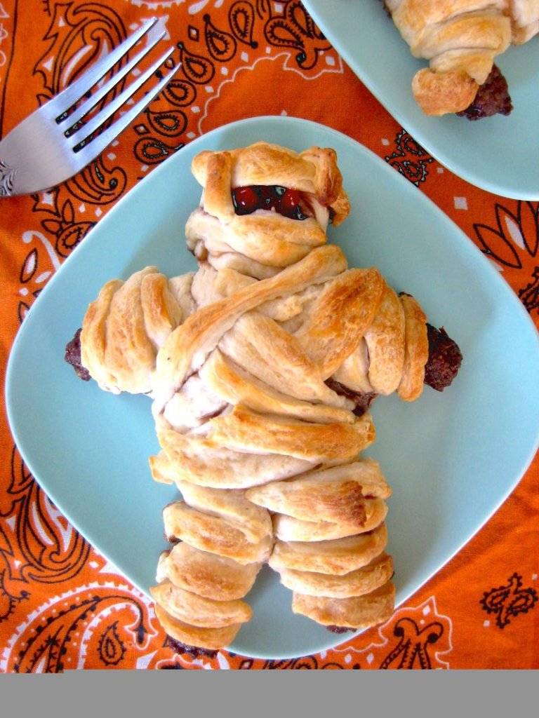 Maggie da Silva’s “meatloaf mummy,” wrapped in strips of biscuit dough, fixes its eater with a baleful red (ketchup-y) glare.