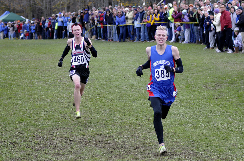 Nick Morris of Scarborough, left, gains in the stretch and at the finish line, just beat Harlow Ladd of Messalonskee to repeat as the Class A state champion Saturday.