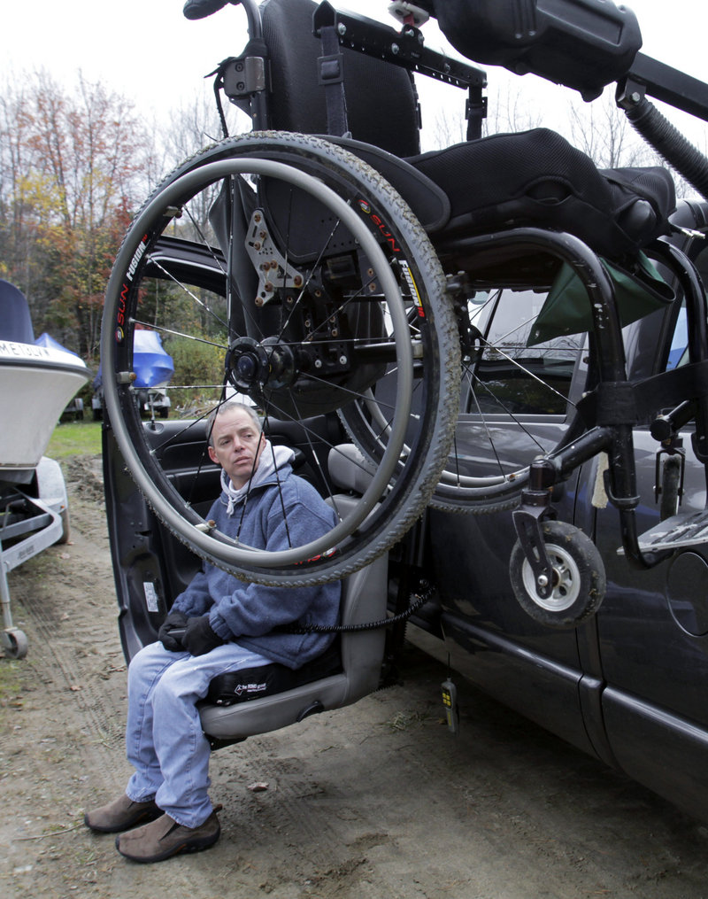 Nick Masi III maneuvers his wheelchair into his vehicle at a boatyard in Arundel after checking on his fishing boat, which was swamped at sea last month. Masi had taken several friends on a fishing trip off the Maine coast, but rough water swamped and overturned the boat. Despite a rescue, Masi’s best friend did not survive the ordeal.