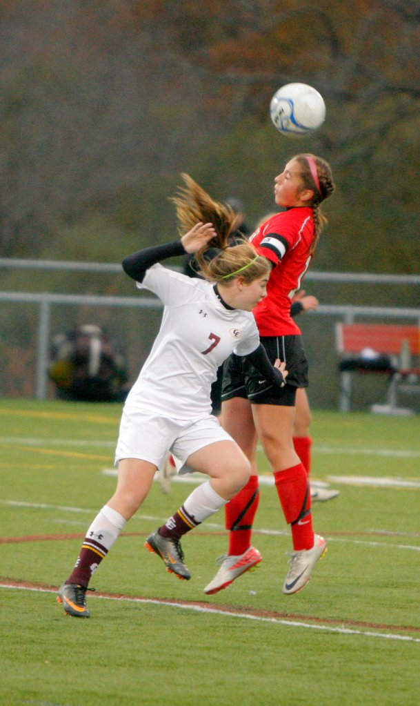 Cape Elizabeth’s Melanie Vangel, left, and Scarborough’s Jessica Broadhurst fight for the ball Saturday. The Red Storm move on to the regional final at Gorham.