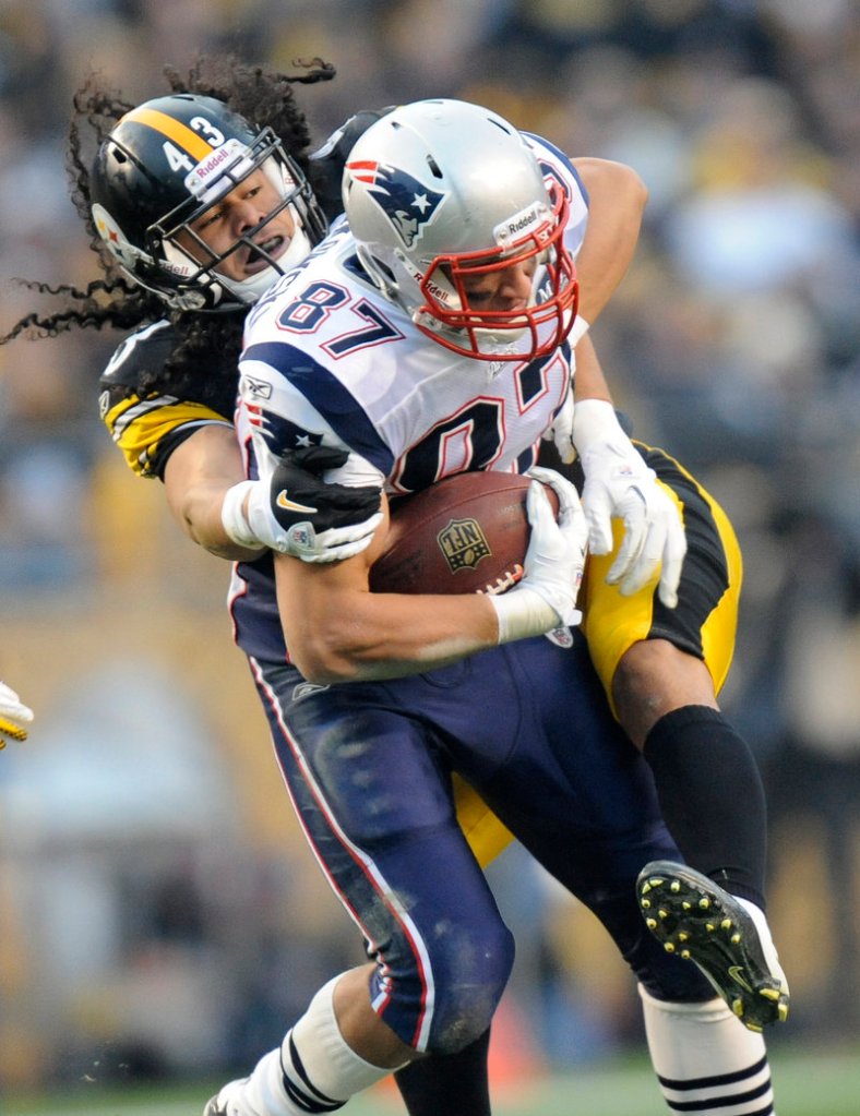 Rob Gronkowski had seven catches for 94 yards Sunday, but Troy Polamalu and the Steelers defense slowed down New England’s high-powered offense.