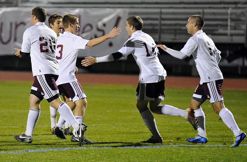 Devin Pelletier, second from right, celebrates his first goal of the season – part of an offensive onslaught for Windham in a 5-0 victory over Cape Elizabeth on Wednesday night in a Western Class A quarterfinal. The Eagles will face Cheverus in the semifinals.