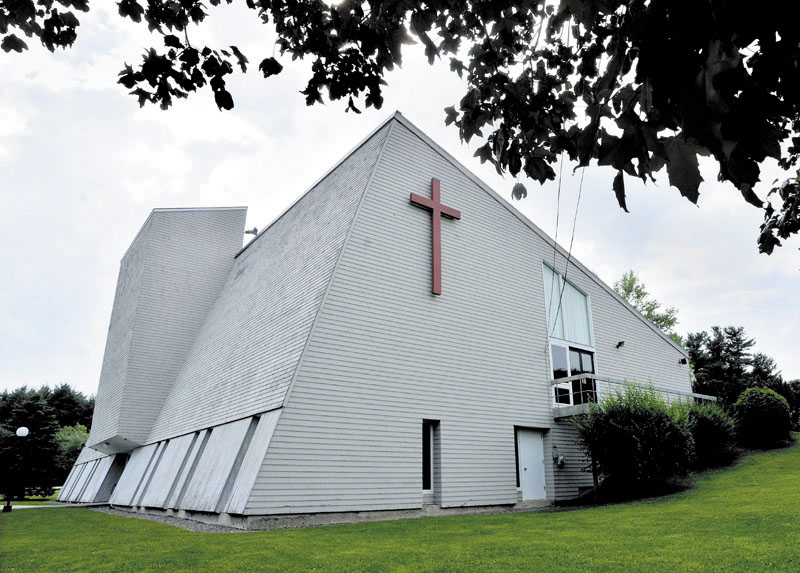 St. Andrew’s Roman Catholic Church in Augusta, above, and St. Leo’s in Litchfield have been put up for sale.