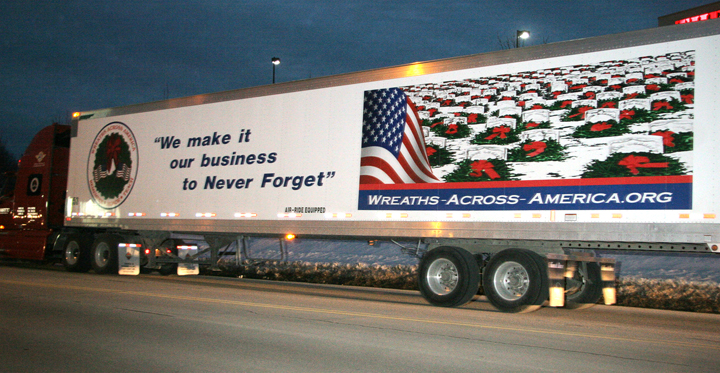 In this Dec. 10, 2007, photo, a tractor trailer from Worcester Wreath Co. in Harrington sets off on its trip to deliver thousands of holiday wreaths to Arlington National Cemetary in Virginia.