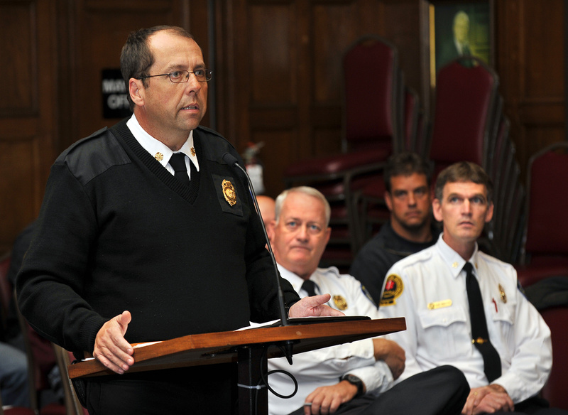 Portland Fire Chief Fred LaMontagne speaks about the proposed changes in regulations for use of the city's fireboat at a Public Safety Committee meeting Tuesday. Sitting are Deputy Fire Chief Terry Walsh, left, and Deputy Fire Chief David Pendleton.
