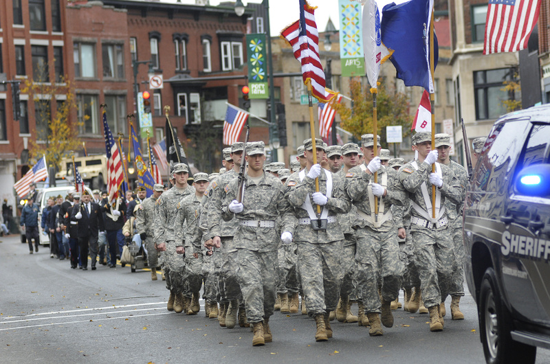 The Veterans Day parade processes down Congress Street in Portland today.