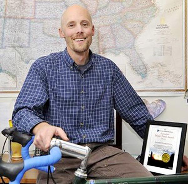 Apogee Adventures, founded by Kevin Cashman, above, won the 2011 Pacesetter Bicycle Travel Award from the Adventure Cycling Association because its youth trips emphasize hard work and community service.