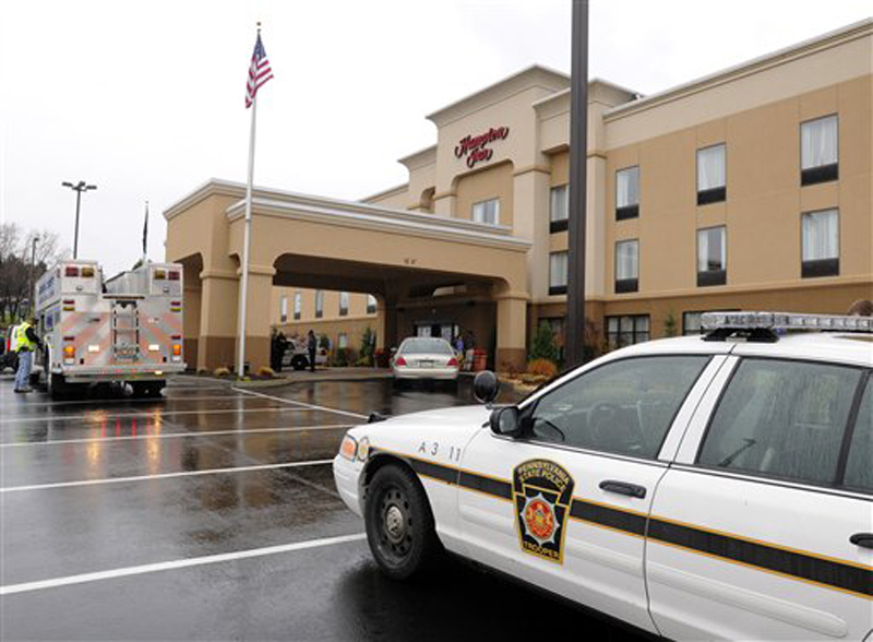 State Police in Indiana, Pa., arrest a suspect in connection with the White House shooting, at the Hampton Inn along Indian Springs Road in Indiana, Pa., Wednesday, Nov. 16. 2011. Oscar Ramiro Ortega-Hernandez, 21, was arrested without incident, according to police. (AP Photo/The Indian Gazette, Tom Peel)