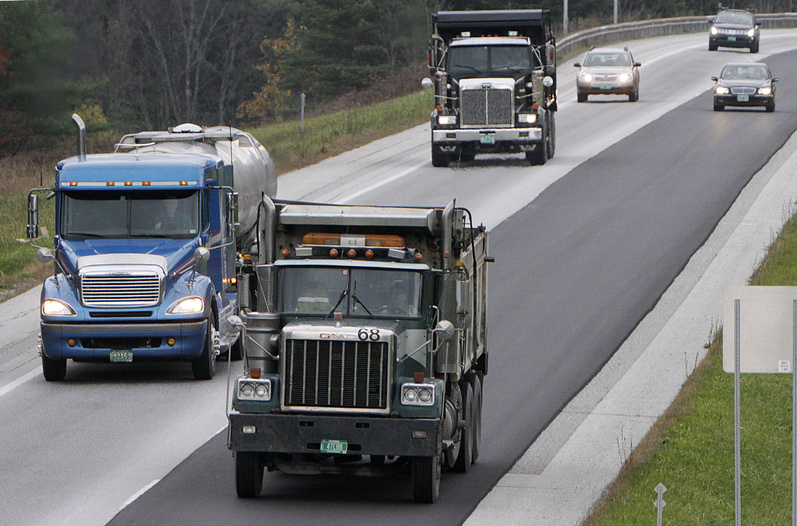 Trucks travel on Interstate 89 in Berlin, Vt. Trucks that weigh up to 100,000 pounds will be allowed on interstate highways in Maine and Vermont under an agreement reached in Congress on Thursday.