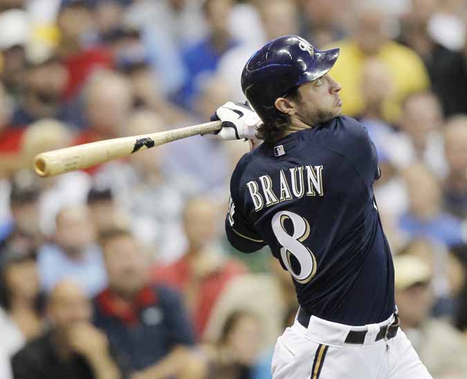 Milwaukee Brewers' Ryan Braun follows through for a home run during a game against the Los Angeles Dodgers.