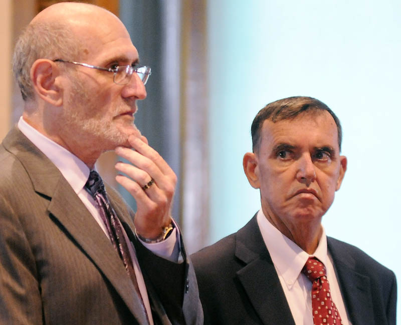 MAKING A MOTION: Rep. Frederick L. Wintle, R-Garland, right, listens to his attorney, Leonard Sharon, discuss the status of cases against him for criminal threatening with a dangerous weapon and carrying a concealed weapon during a Kennebec County Superior Court hearing held in August. Wintle is accused of pulling a loaded handgun on a stranger in a Waterville Dunkin’ Donuts parking lot May 21.