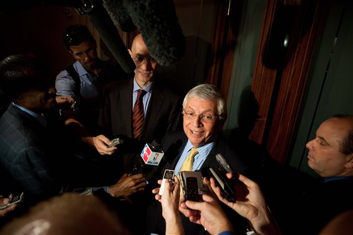 NBA Commissioner David Stern, center, speaks to reporters after a meeting between the NBA Players Association and owners to discuss a new labor deal and possibly avert a lockout, Friday, Sept. 30, 2011, in New York. (AP Photo/John Minchillo)