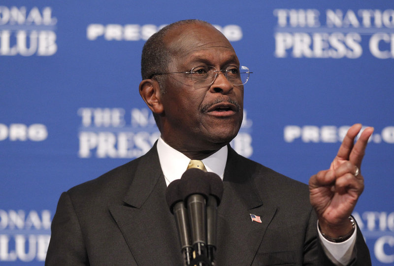 GOP presidential candidate Herman Cain answers questions at the National Press Club. A prominent conservative called harassment allegations against Cain a “high-tech lynching.”