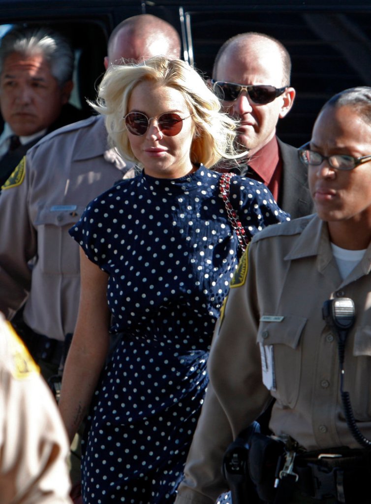 Bad-girl actress Lindsay Lohan arrives Wednesday at a Los Angeles court, where she received a 30-day sentence and the threat of 270 days more.