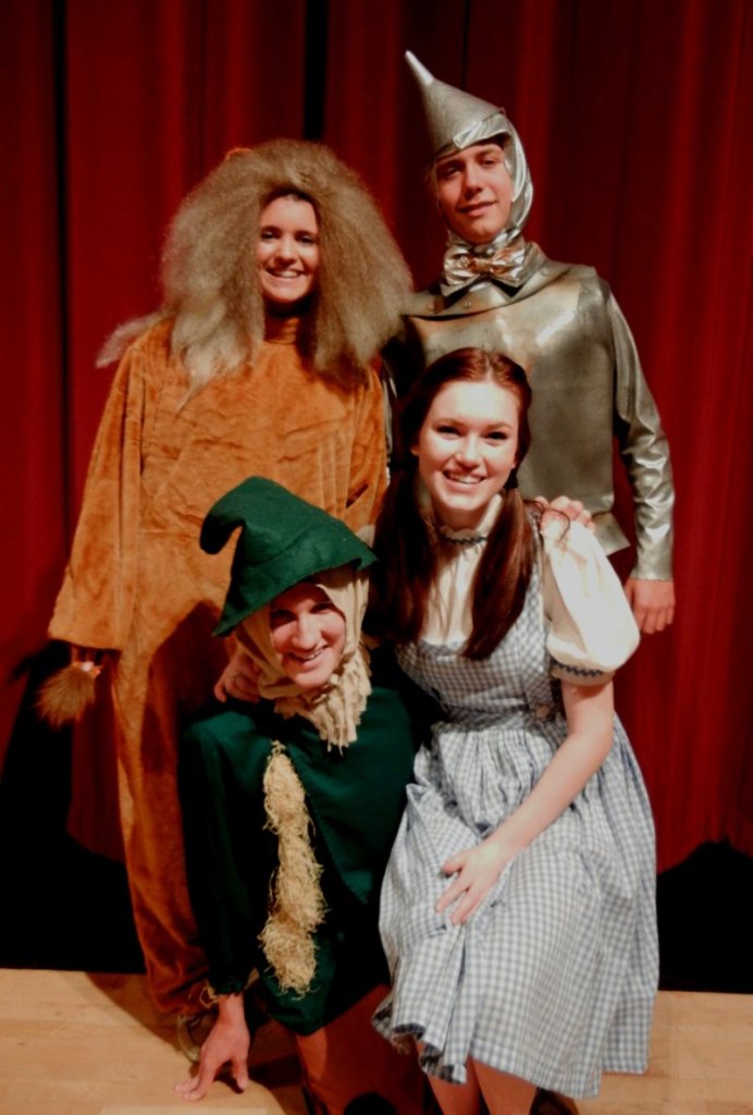 The Cowardly Lion, Tin Man, Scarecrow and Dorothy Gale (Whitney Bolduc, Jamie McBride, Brad Meader and Georgia Noonan, respectively) pause for a picture while rehearsing Windham High School’s “The Wizard of Oz.”