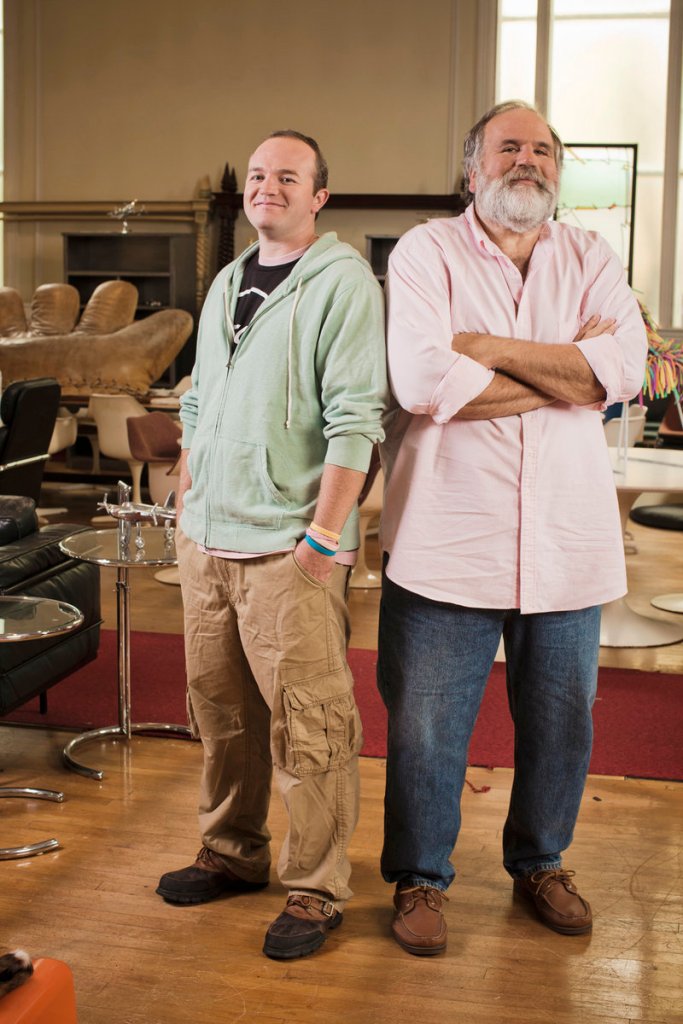 The Pasternaks, Jerry, right, and his son Jeremiah, stand in their antiques warehouse in Rockland. A new Planet Green cable TV show features the pair’s search for unusual antiques that they warehouse in Rockland and sell online. “Our show is not just about the thrill of the hunt, it’s also about the art of the deal,” says Jeremiah.