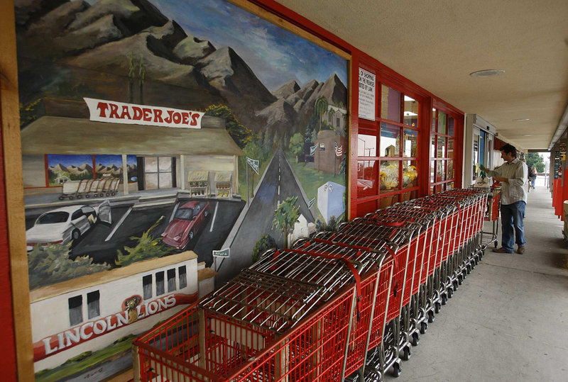 Carts are lined up at a Trader Joe’s store in La Crescenta, Calif., that’s slated for closing when the chain opens a larger location nearby.