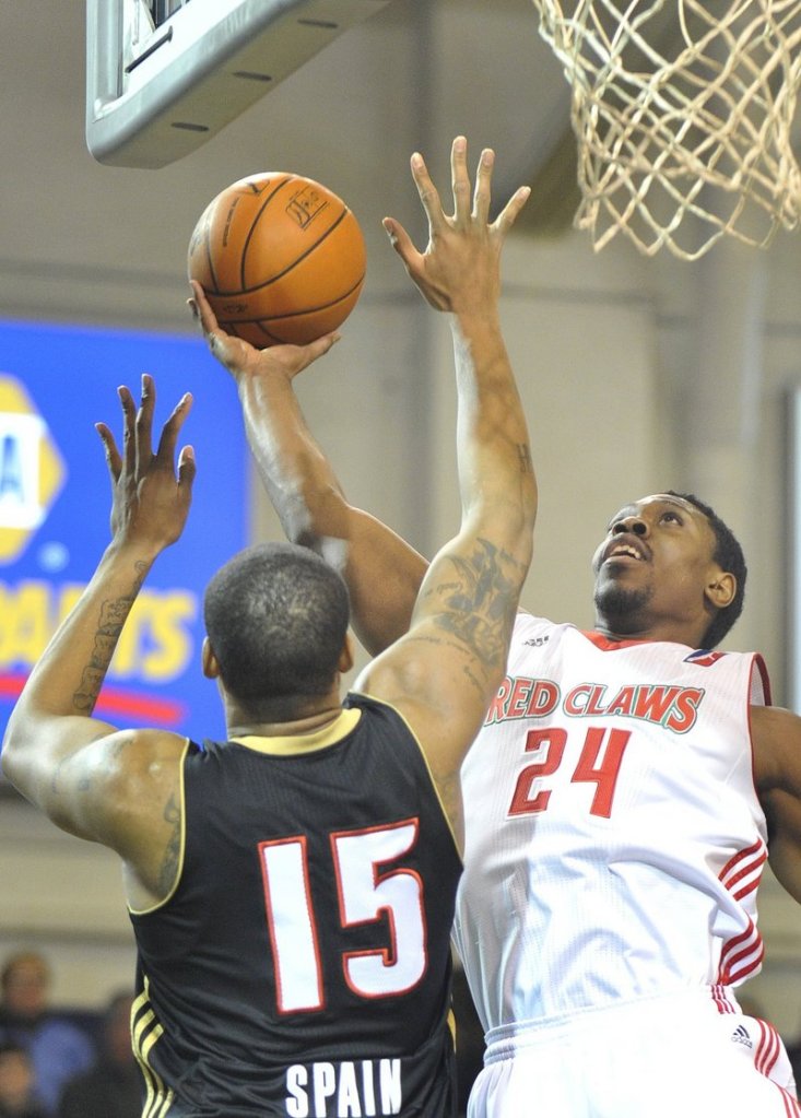 Paul Harris, right, will be returning to the Maine Red Claws after buying out his contract midway through last season and starring for a team in the Philippines.
