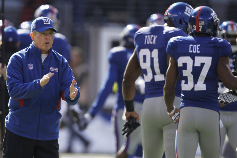 Tom Coughlin and the Giants are in first place in the NFC East with a 5-2 record heading into today’s game at New England, which is tied for first in the AFC East, also at 5-2.