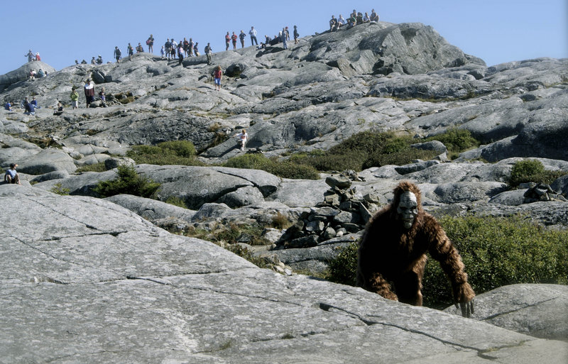Jonathan Doyle wears his Bigfoot costume on Mount Monadnock in Jaffrey, N.H., in this Sept. 6, 2009, file photo. Doyle, an amateur filmmaker, recorded the “sighting” on video, but when he and his small crew returned to shoot a sequel, they were denied access to the state park because they hadn’t applied for a $100 special-use permit 30 days in advance.