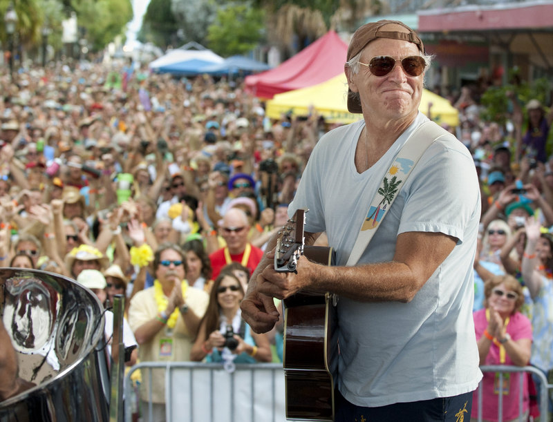 Jimmy Buffett surprised some 3,500 of his fans in Key West, Fla., with an appearance Friday at the Parrot Heads Convention.