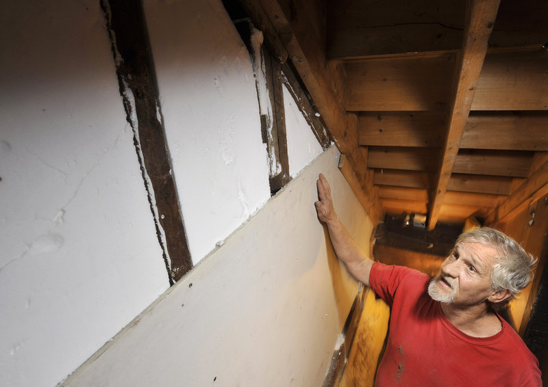 Mark Mowatt of Portland cut his oil use in half with a big weatherization effort on his Bradley Street home. Mowatt had the walls and attic insulated, the rim joist sealed and a new furnace installed at a cost of $10,000.